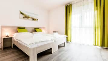 Desk, laptop workspace, free WiFi, bed sheets