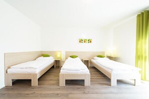 Triple Room, Courtyard View | Laptop workspace, free WiFi, wheelchair access