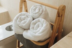 Hair dryer, bidet, towels, soap