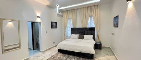 Economy Room, Balcony, City View | Desk, laptop workspace, blackout curtains, soundproofing