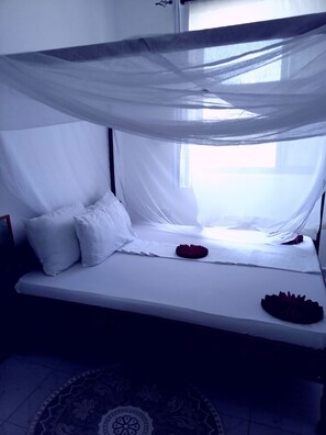 1 habitación, tabla de planchar con plancha, wifi y ropa de cama 