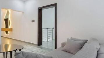 Economy Room, Balcony, City View | Living area