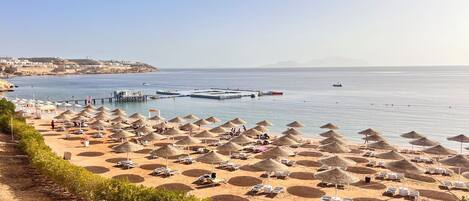 Sun-loungers, beach towels