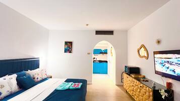 1 quarto, cofres nos quartos, ferros/tábuas de passar roupa