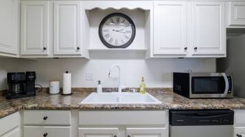 Coffee/tea maker, fridge, microwave, oven