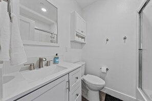 Hair dryer, towels, soap, toilet paper