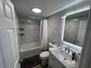 Hair dryer, towels, soap, toilet paper
