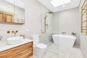 Shower, hair dryer, towels, soap