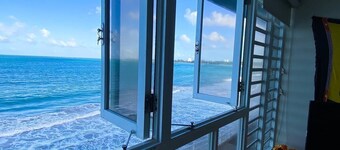 Oceanfront Paradise on Luquillo Beach 2-bedroom rooftop Puerto Rico Island
