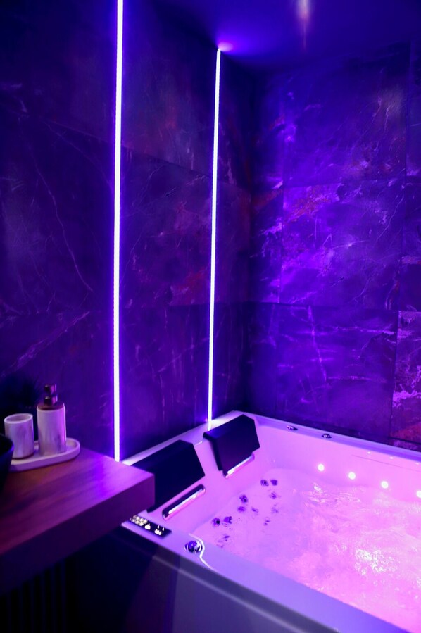 Jetted bath, hair dryer, towels, soap
