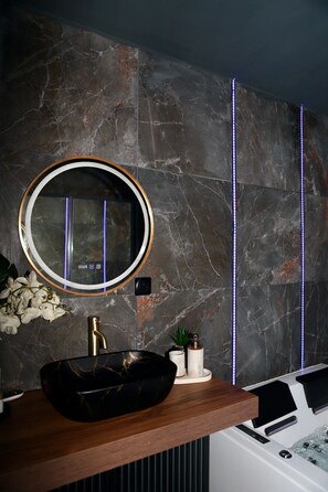 Jetted bath, hair dryer, towels, soap