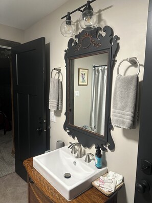 Hair dryer, towels, soap, toilet paper