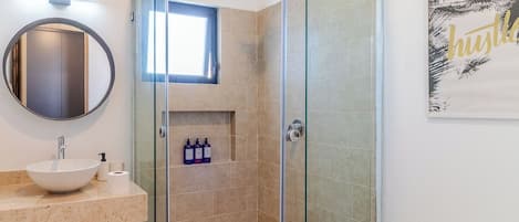 Shower, hair dryer, towels, soap