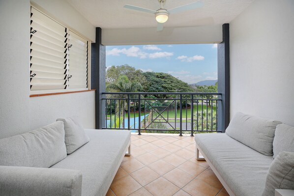 Deluxe Apartment, Balcony, Sea View | Balcony - Tropical Comfort Pool and Esplanade View (Cairns North)