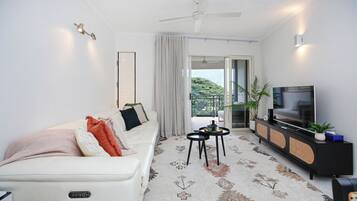 Deluxe Apartment, Balcony, Sea View | Living area