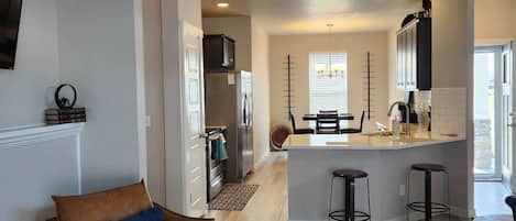 Smart TV, fireplace, table football, books