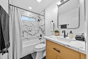 Hair dryer, towels, soap, toilet paper