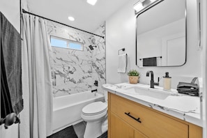 Hair dryer, towels, soap, toilet paper