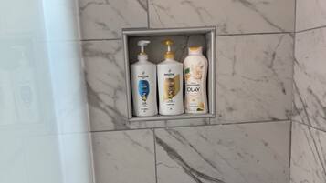 Hair dryer, towels, soap, shampoo