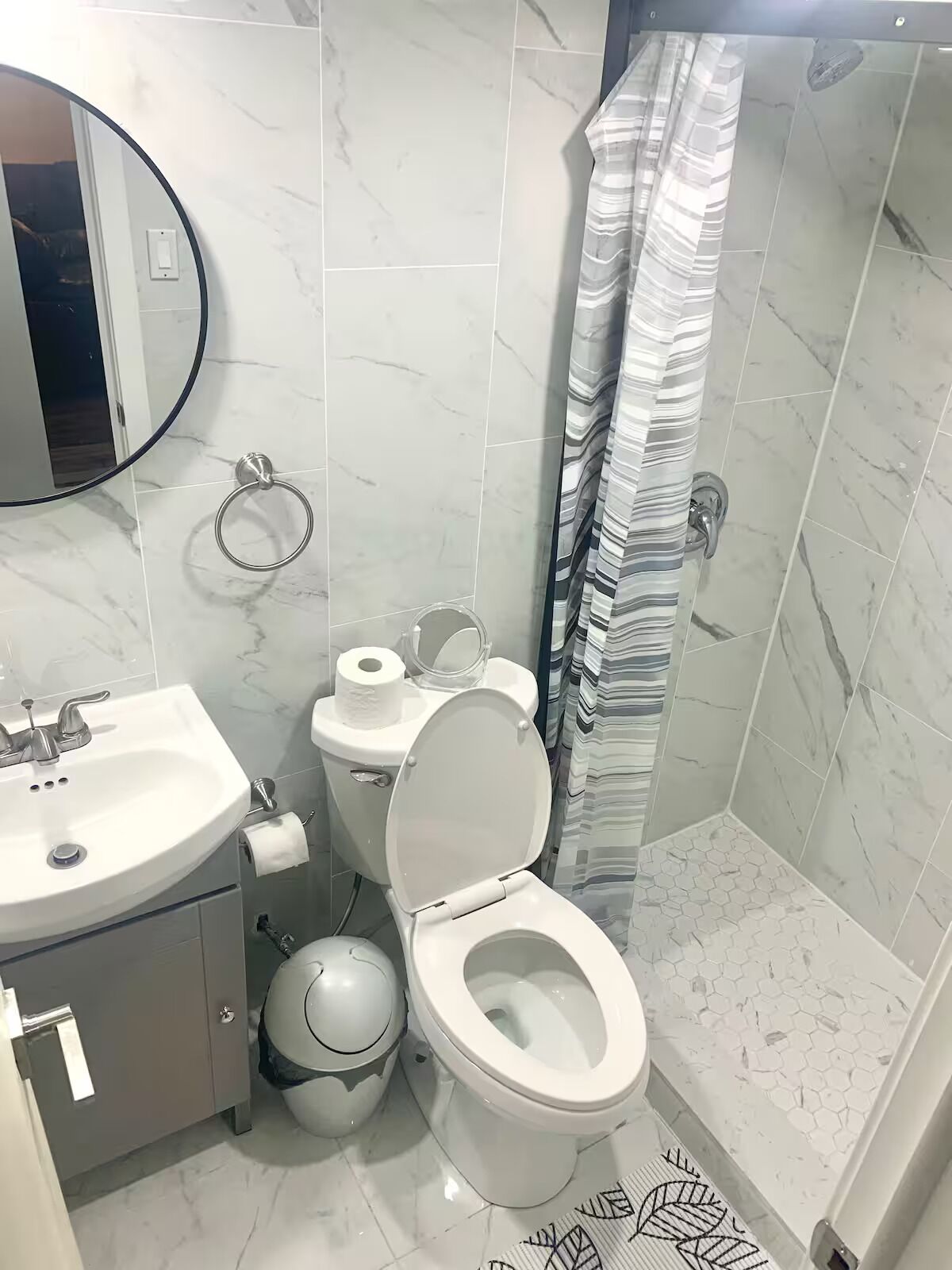 Shower, towels, soap, toilet paper