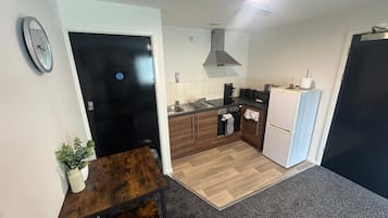 Economy Apartment, 1 Double Bed with Sofa bed | Living area | 32-inch TV with digital channels