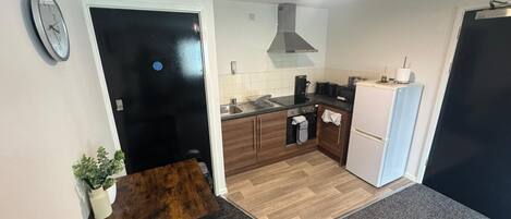 Economy-huoneisto, 1 parisänky ja vuodesohva | Oleskelualue | 32–tuumainen televisio, jossa digitaalikanavat