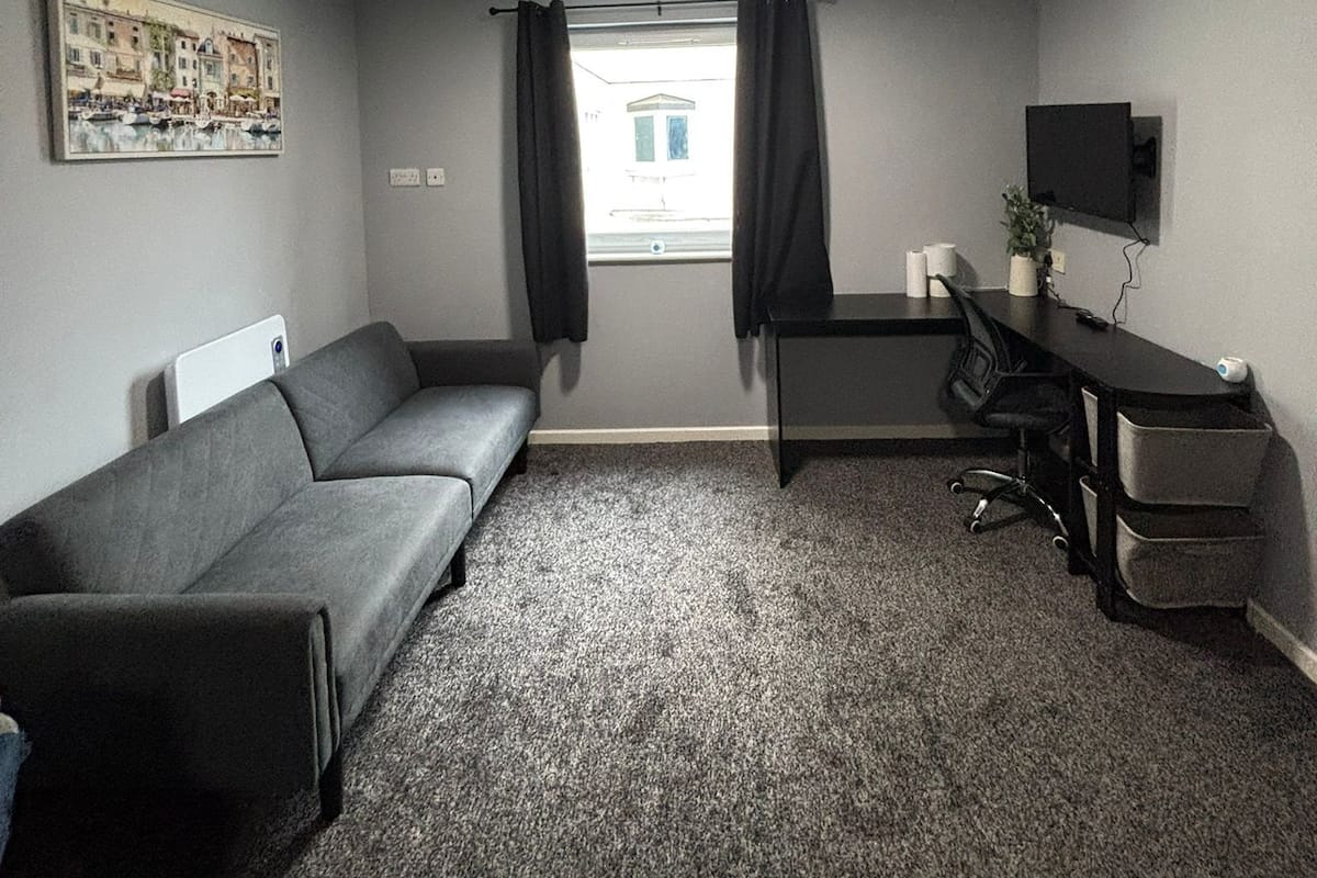 Economy Apartment, 1 Double Bed with Sofa bed | Living area | 32-inch TV with digital channels