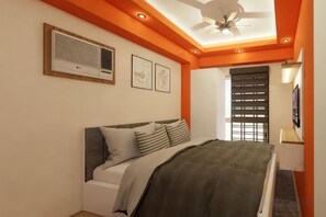 A bedroom with a bed, ceiling fan, air conditioning unit, and artwork on the walls. - Near Manila Airport, "Hotel Style" Studio Condo With Kitchen + Pool, 5G (Paranaque)