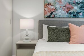1 bedroom, desk, bed sheets