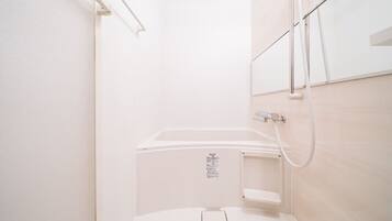 Hair dryer, bidet, towels, soap