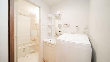 Hair dryer, bidet, towels, soap