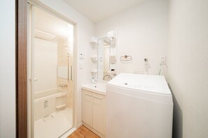 Hair dryer, bidet, towels, soap