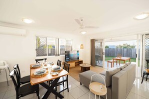 Living area - Soothing 4-bedroom house with AC in Yarrabilba (Yarrabilba)
