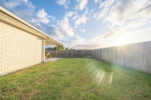 Property grounds - Soothing 4-bedroom house with AC in Yarrabilba (Yarrabilba)