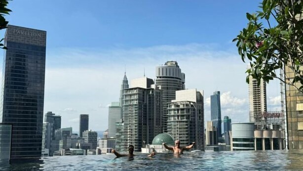 A cityscape with modern buildings and a large body of water in the foreground. - Axon Residence Kuala Lumpur KLCC Pavillion BB (Kuala Lumpur)