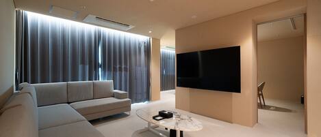 Luxury Suite, Balcony, Partial Ocean View | Living area | Computer monitors, printers