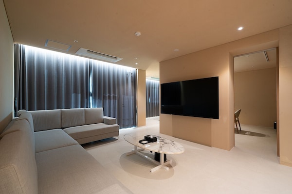 Luxury Suite, Balcony, Partial Ocean View | Living area | Computer monitors, printers