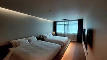 Luxury Suite, Balcony, Partial Ocean View | Iron/ironing board, free WiFi