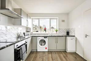 Microwave, oven, dining tables
