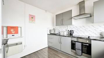 Microwave, oven, dining tables