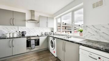 Microwave, oven, dining tables