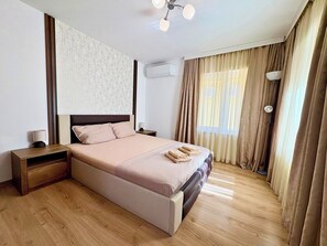 2 habitaciones, tabla de planchar con plancha, wifi y ropa de cama
