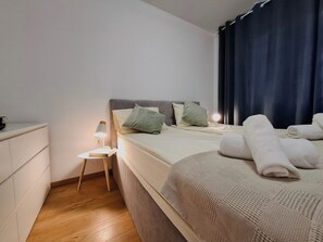2 dormitorios, tabla de planchar con plancha, wifi y ropa de cama