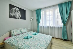 1 habitación, tabla de planchar con plancha, cuna de viaje y wifi 