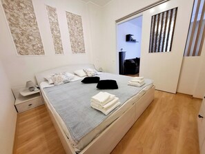 2 chambres, fer et planche à repasser, Wi-Fi, draps fournis