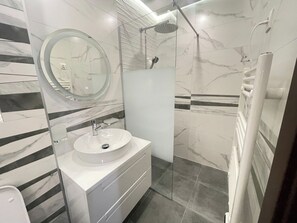 Hair dryer, towels, toilet paper