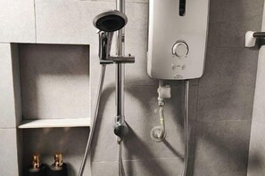 A modern shower with a control panel, a handheld showerhead, and a wall-mounted faucet. - JQ Angel (Little Angel B&B) New/CitySeaview/LV29/Netflix/6pax (Kota Kinabalu)