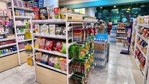 A grocery store aisle with various packaged food items and household goods. - JQ Angel (Little Angel B&B) New/CitySeaview/LV29/Netflix/6pax (Kota Kinabalu)