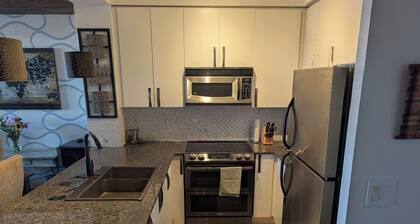 Nature + City Balance Rare 1+Den low-rise condo offers a peaceful