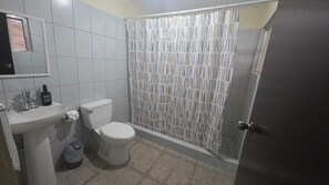 Comfort Double Room, Courtyard View | Bathroom | Towels, soap, shampoo, toilet paper